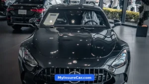 New black Mercedes car in a dealership showroom